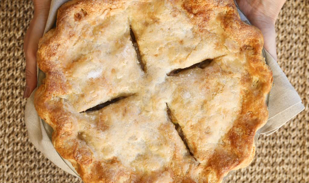 Overhead view of a finished flaky apple pie crust