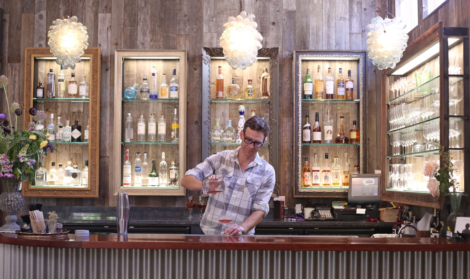 bartender pouring a drink at Barndiva Gallery Bistro bar