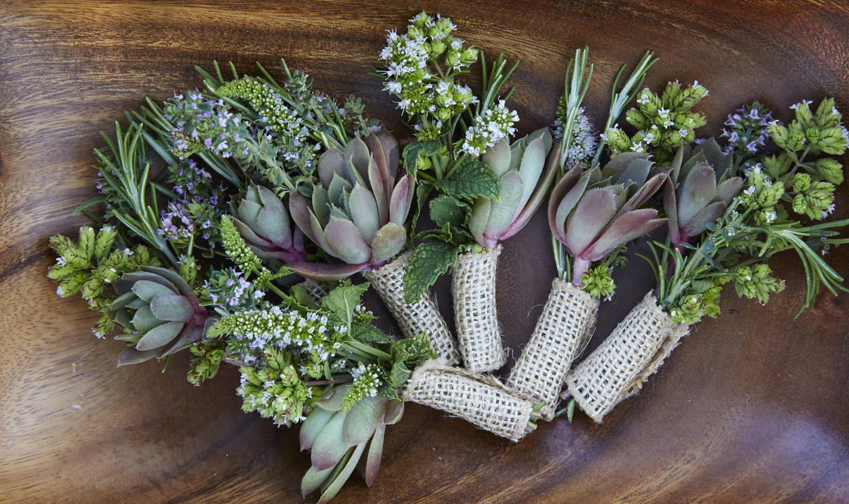 bundles of succulent decorations for a seasonal party