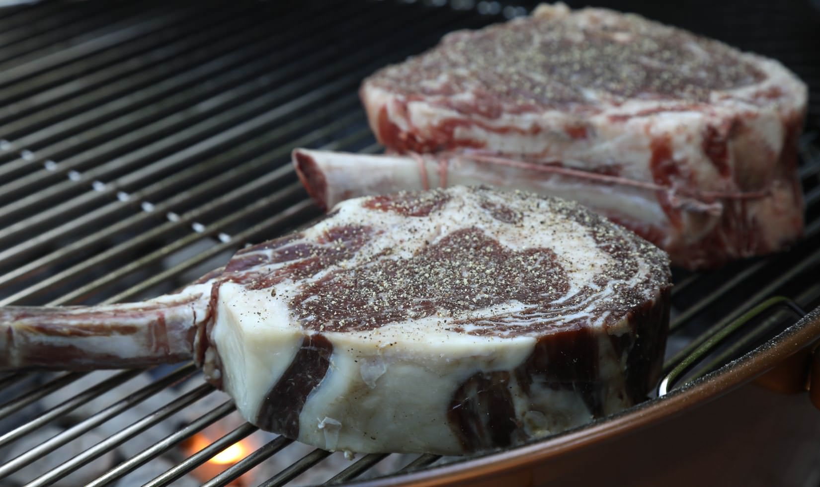 Steaks on the grill seasoned with pepper help complement the natural, herbaceous and spice notes found in cabernet sauvignon.