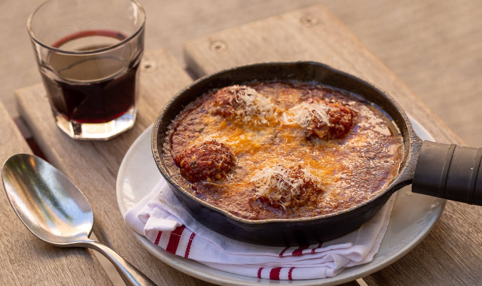 Old School Skillet appetizer with meatballs, tomato sauce and cheese at Healdsburg's Campo Fina