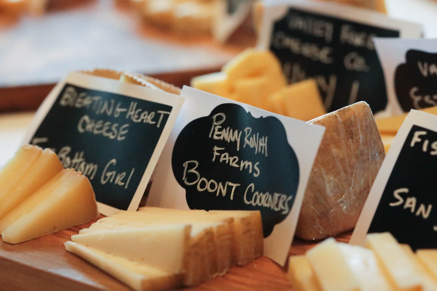 Pieces of Bleating Heart's Fat Bottom Girl cheese cut for tasting.