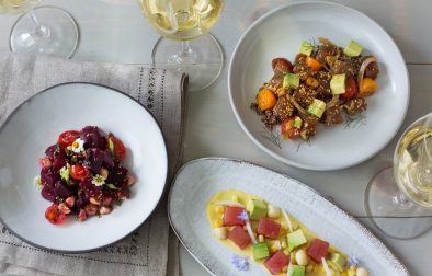 three ahi poke recipes with glasses of Chardonnay