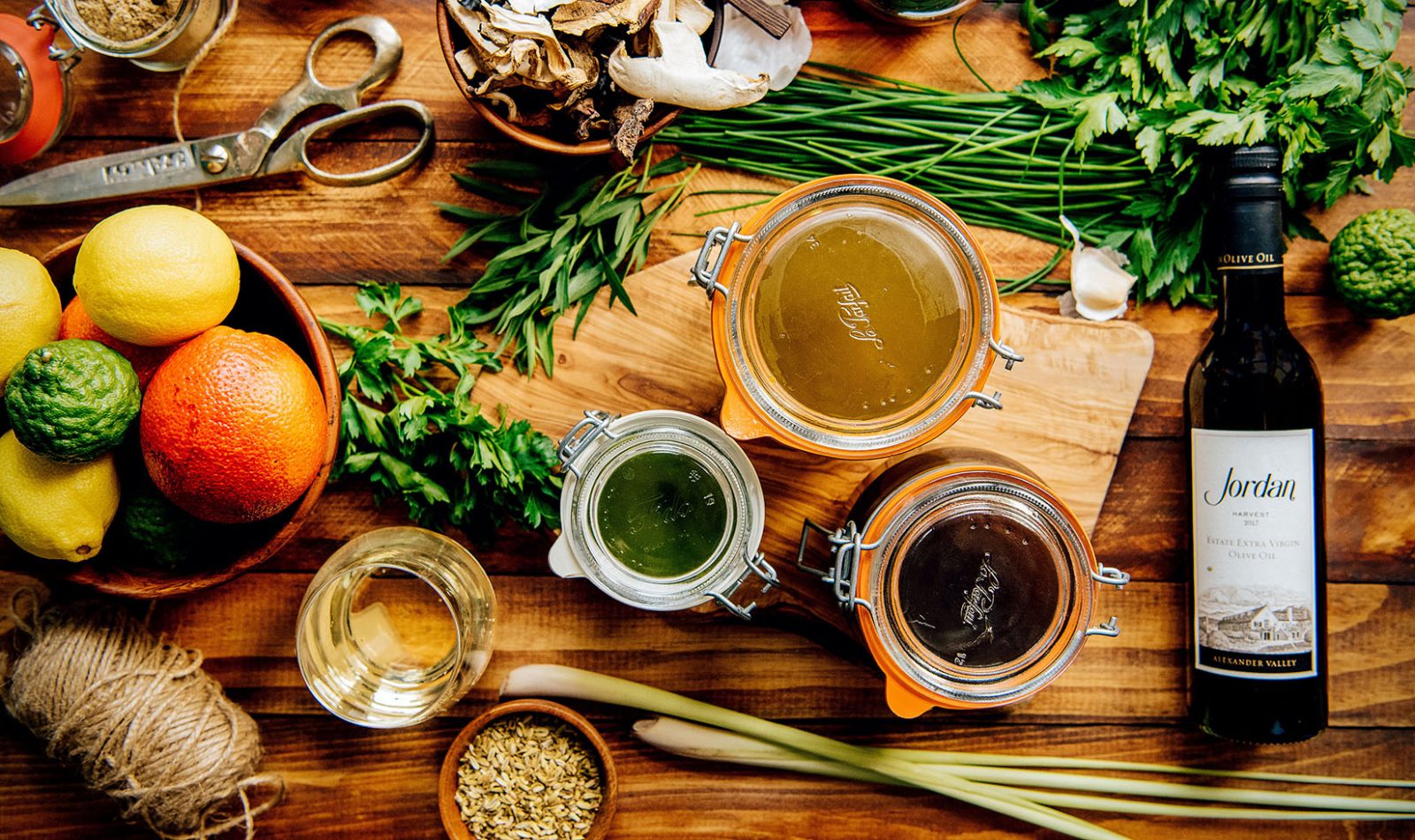 Citrus, Herb and Mushroom-Infused olive oils in mason jars