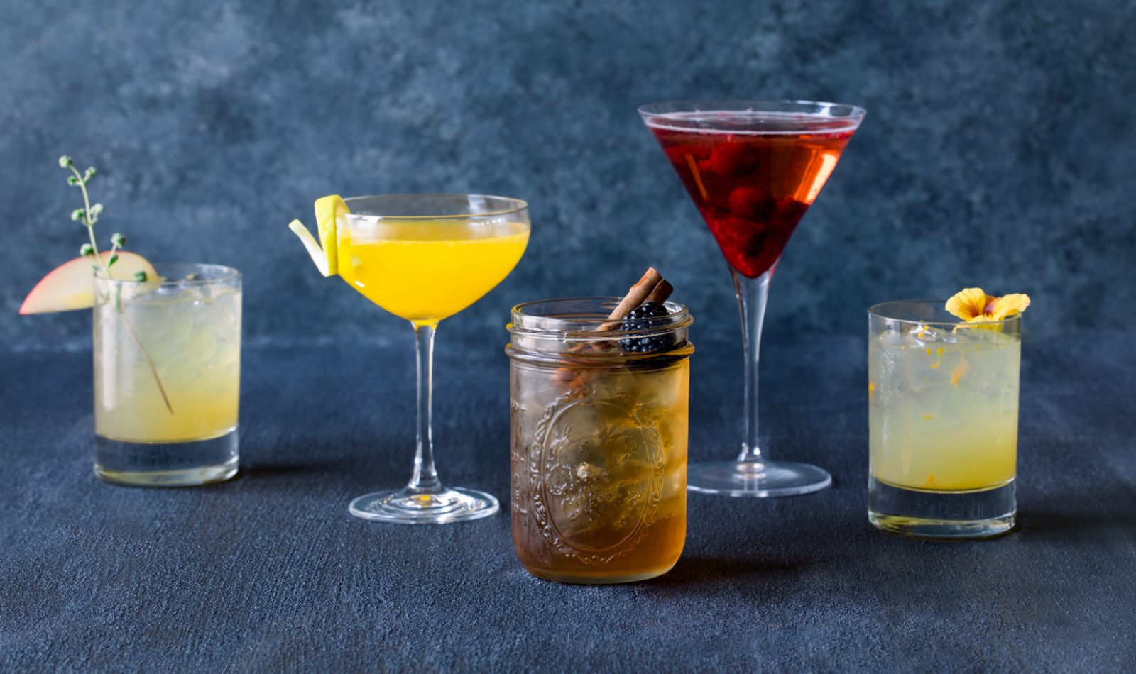 A selection of Halloween cocktails in various glasses