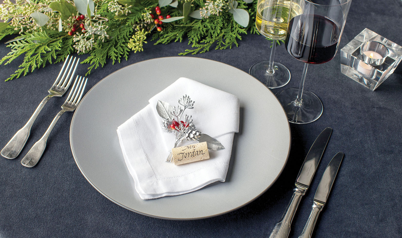 Silver Seeded Eucalyptus place setting on white napkin 