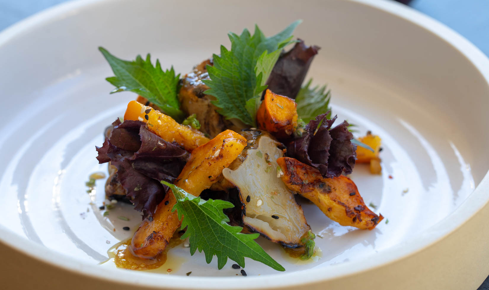 grilled vegetable fall salad on white plate