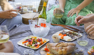 outdoor jordan winery picnic with jordan chardonnay and snacks