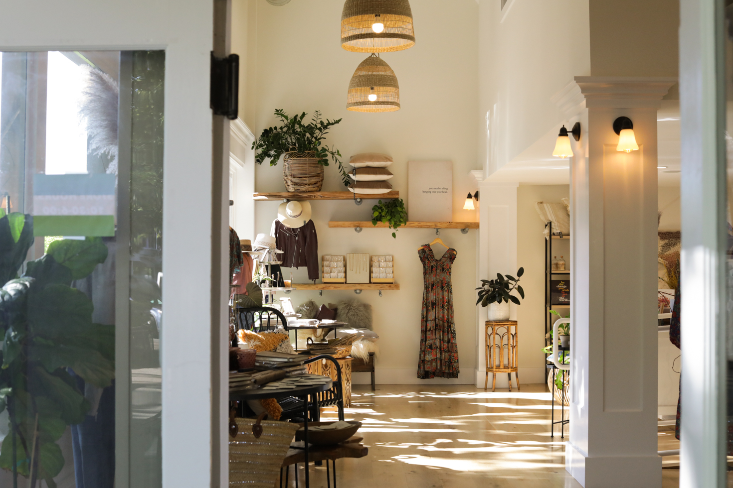 womens clothing store with dresses hanging