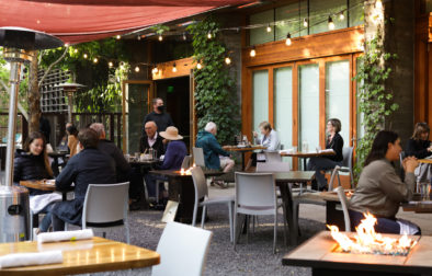 guests sitting outside in restaurant patio