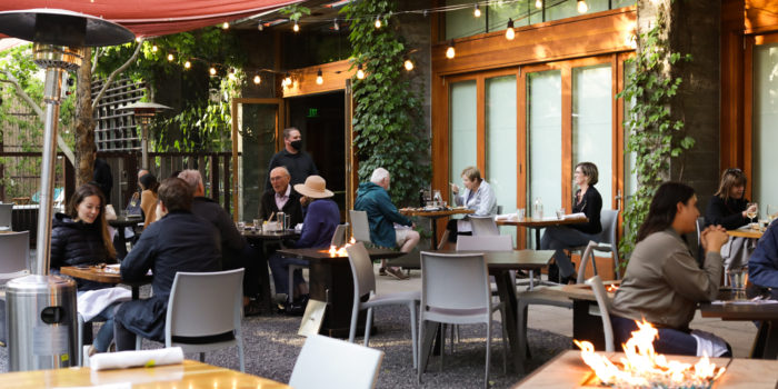 guests sitting outside in restaurant patio