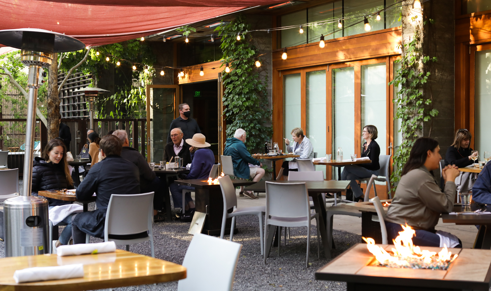 guests sitting outside in restaurant patio