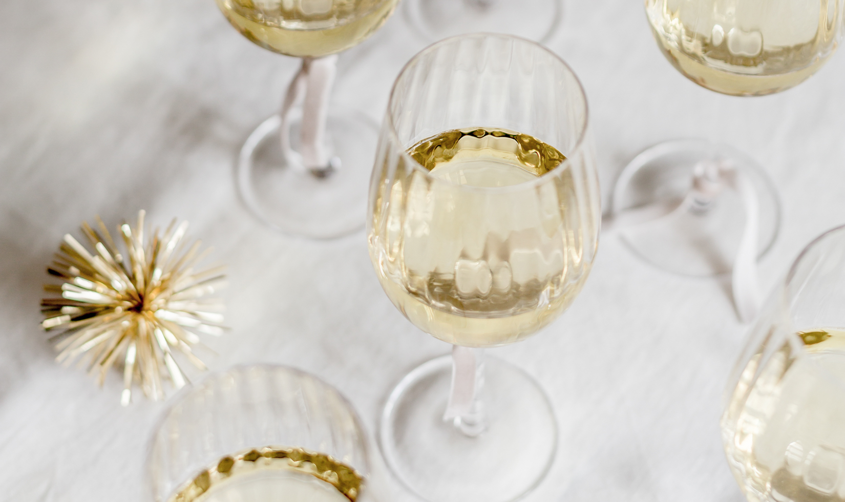 Intimate and Elegant Birthday Party Ideas white wine glasses