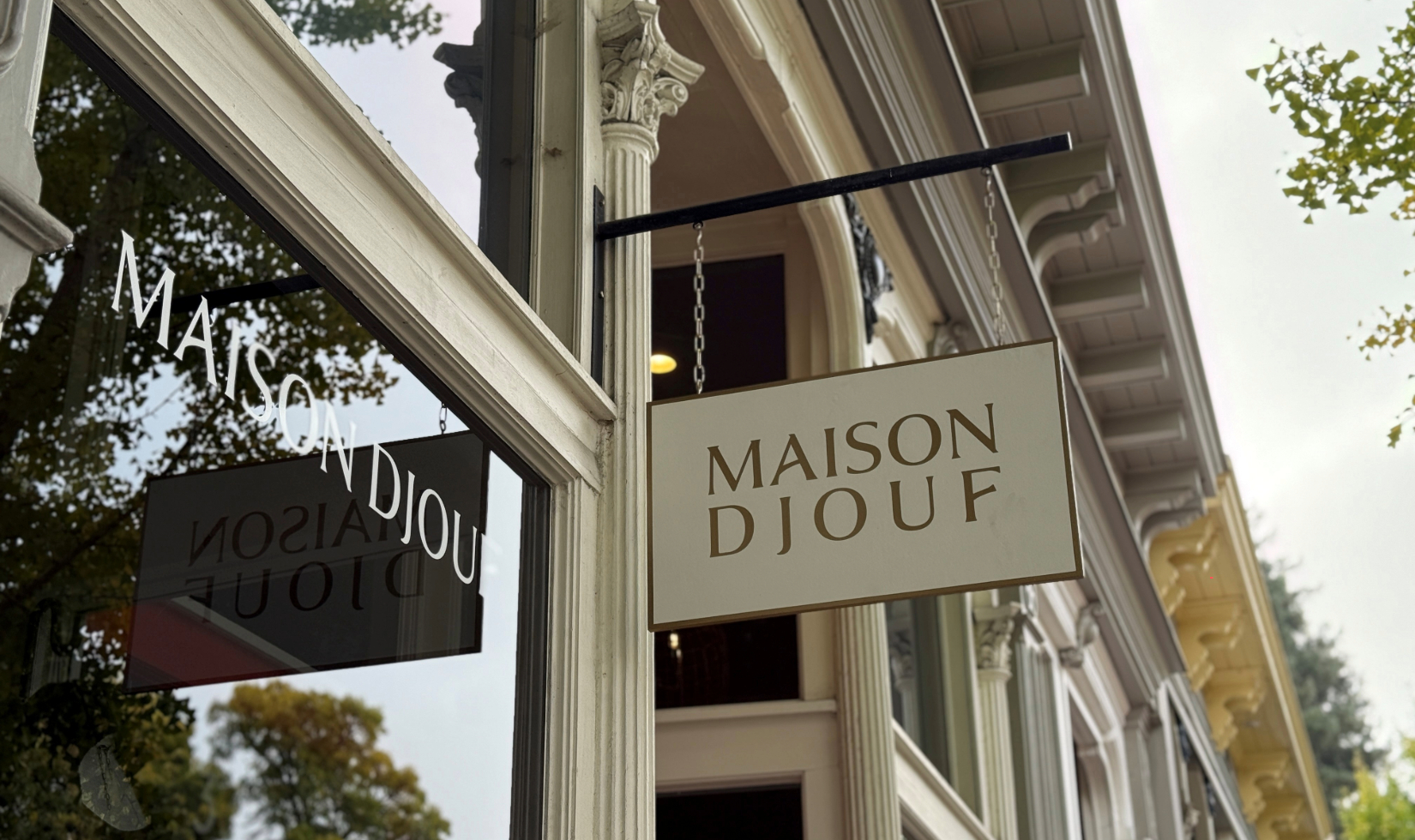the storefront sign for maison djorf